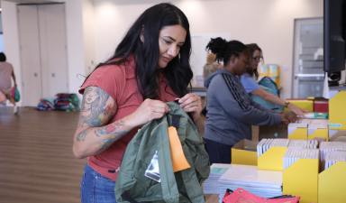 PUBLIC SERVICE MEETS COFFEE AND COMPASSION TO PROVIDE FREE SCHOOL SUPPLIES